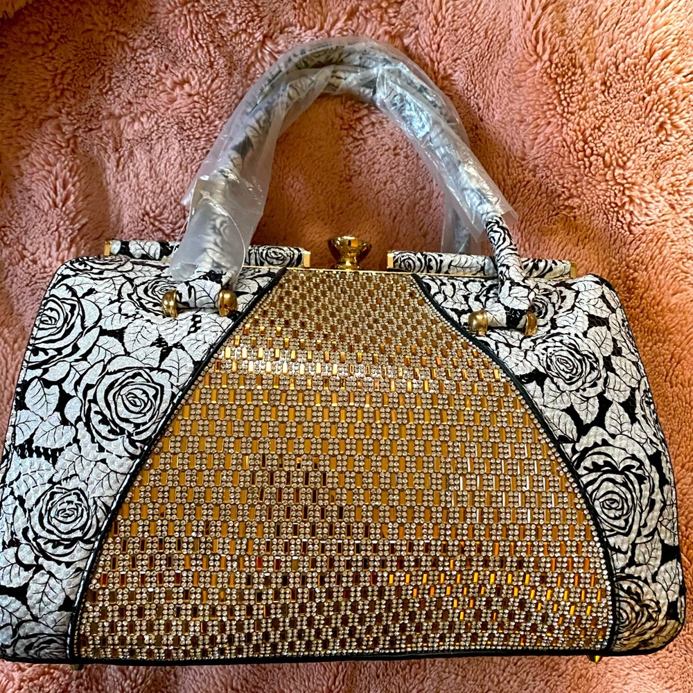 Rise printed textured handbag